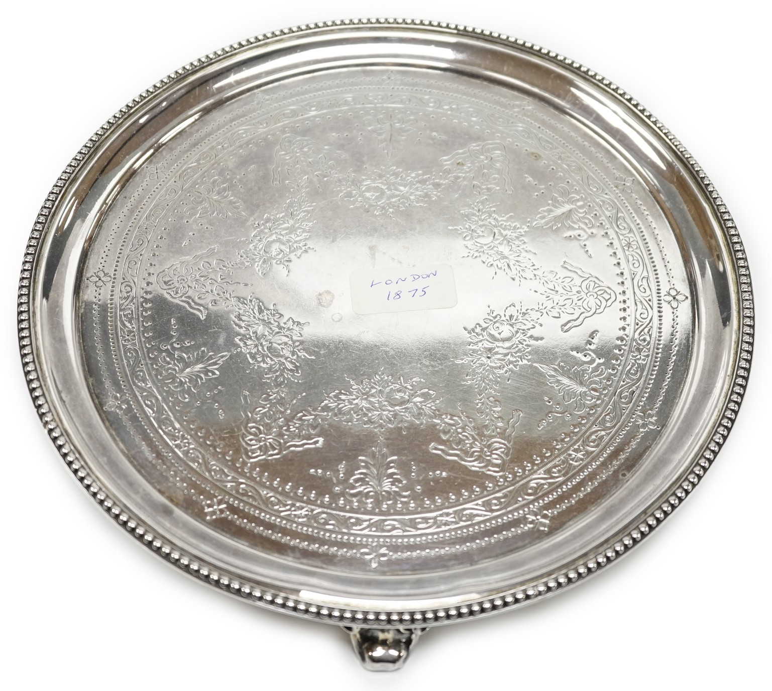 A Victorian engraved silver circular salver, Edward Charles Brown, London, 1875, 25.7cm, 18.8oz.